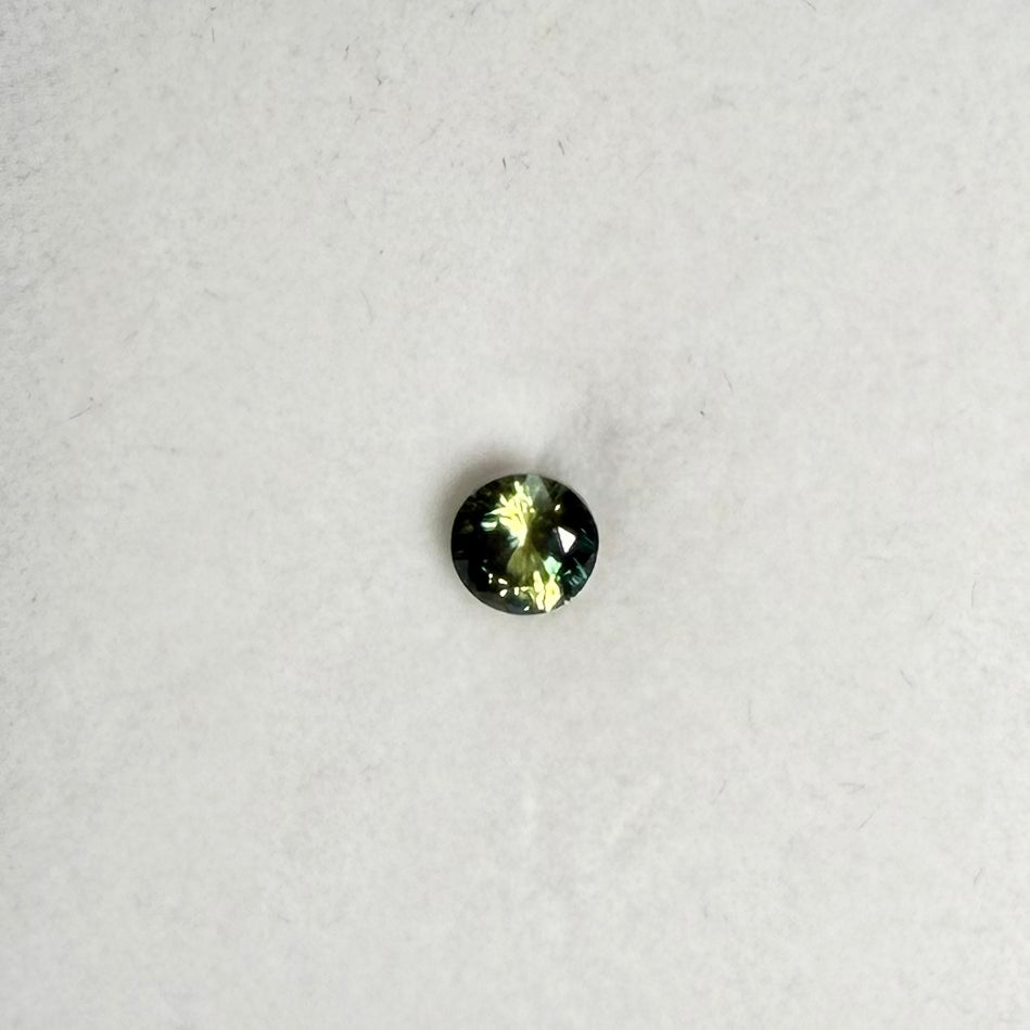 0.85ct Bluish Green Round Sapphire