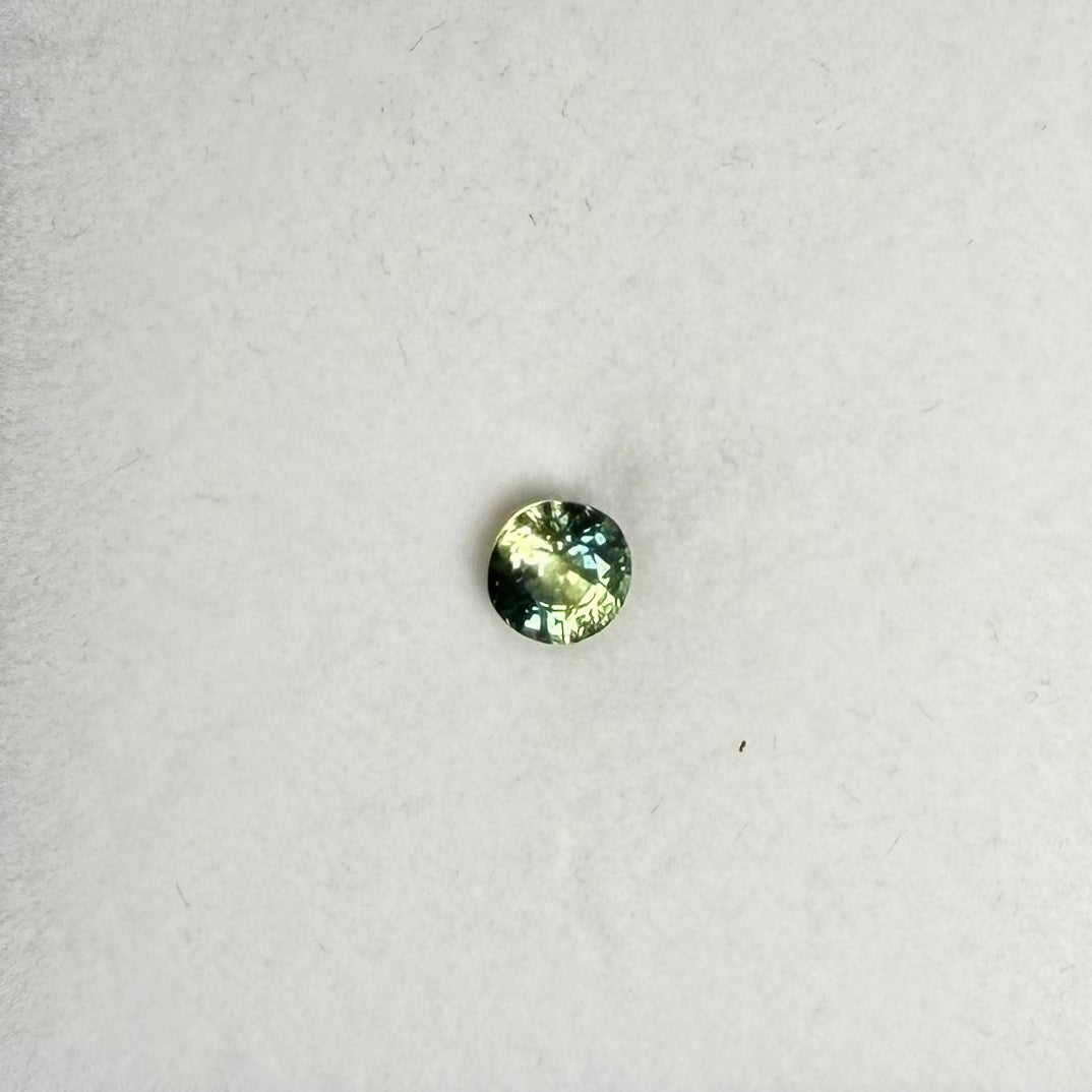 0.81ct Greenish Blue Round Sapphire