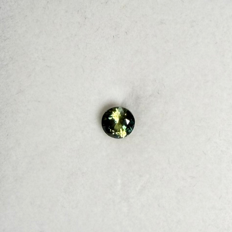 0.85ct Bluish Green Round Sapphire
