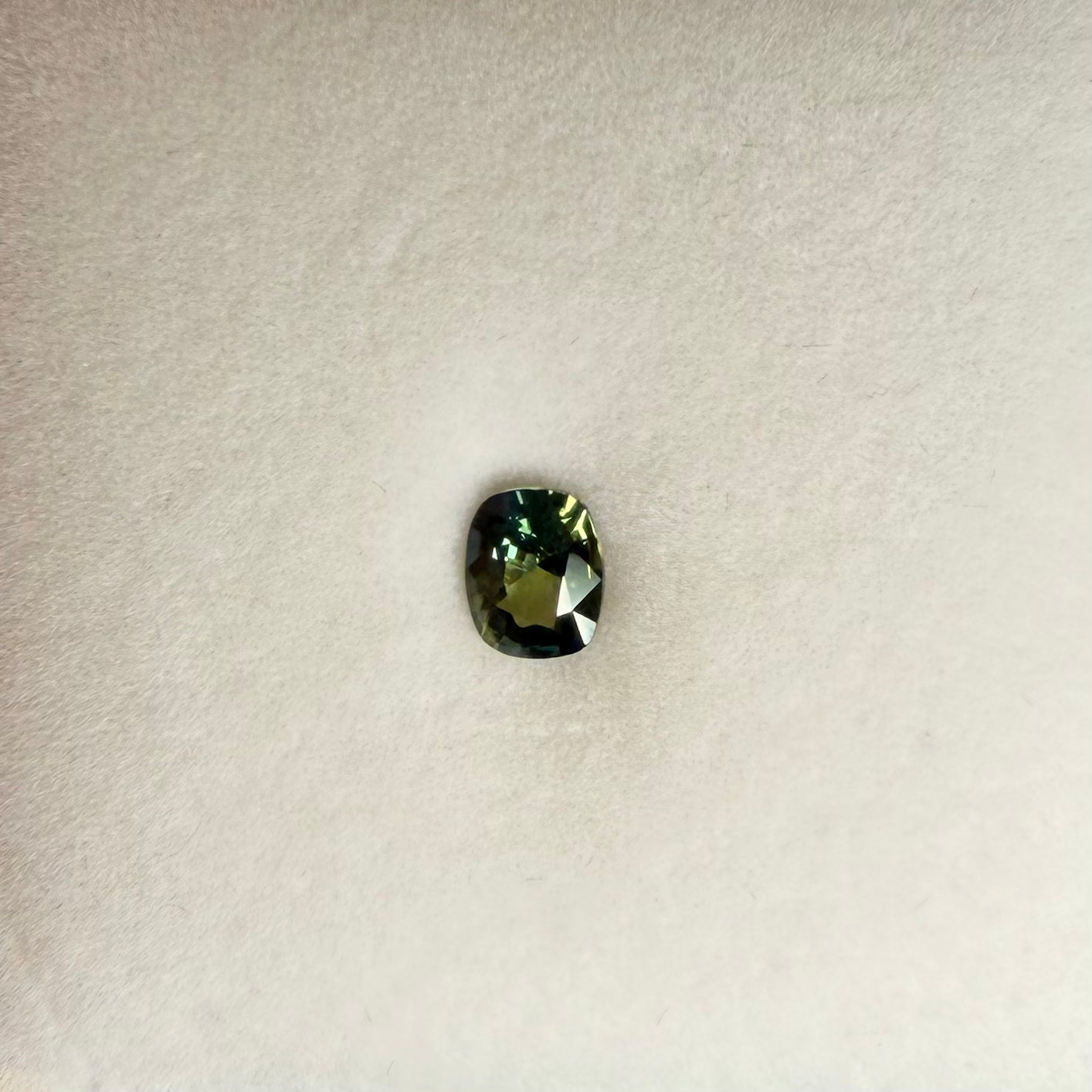 0.93ct Greenish Blue Cushion Sapphire