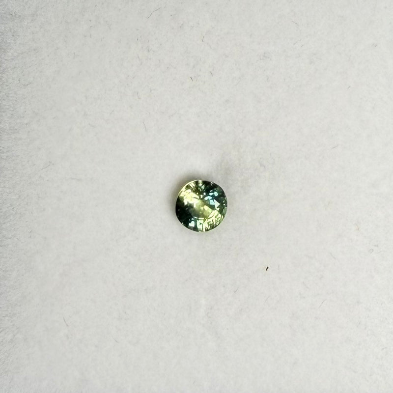 0.81ct Greenish Blue Round Sapphire