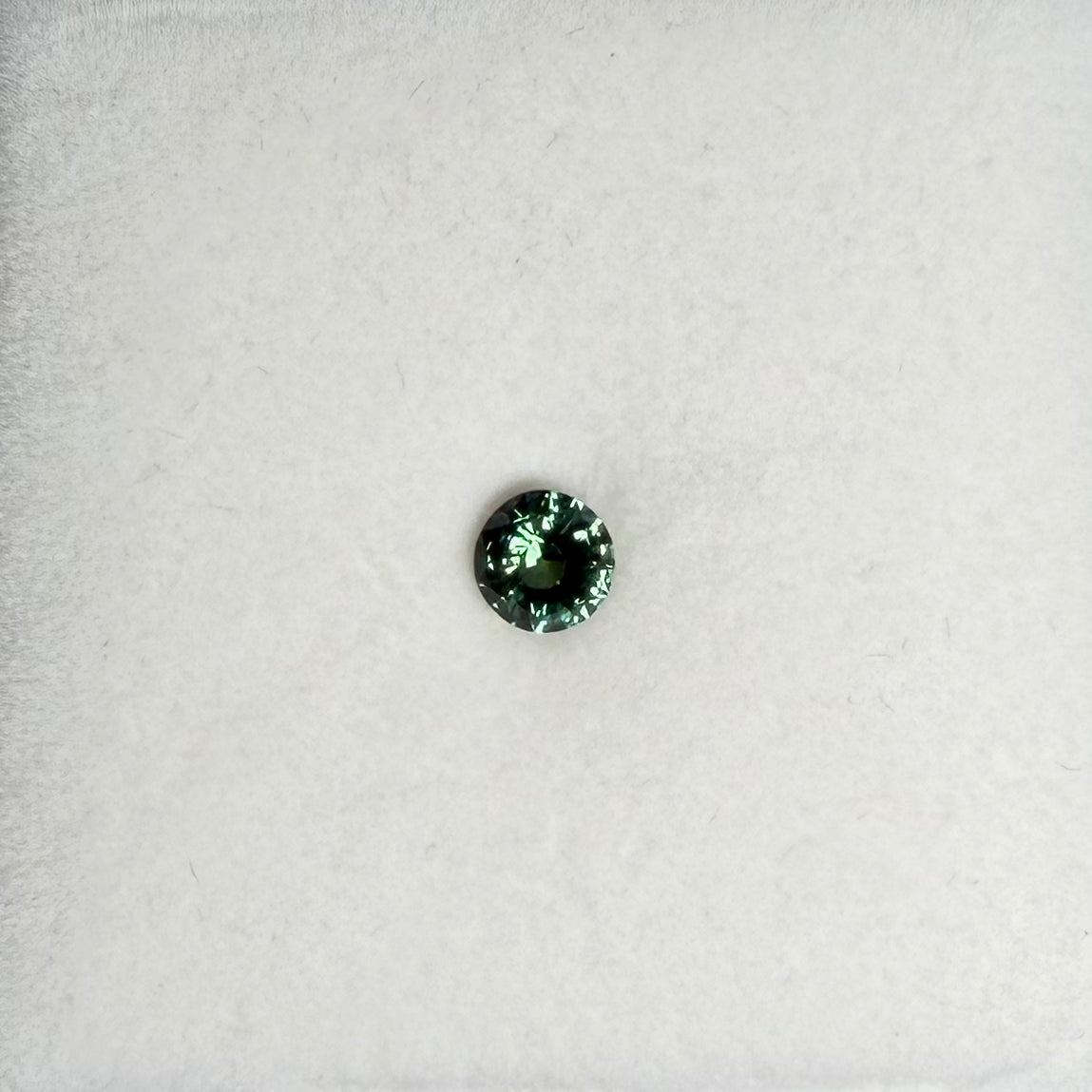 0.85ct Teal Round Sapphire