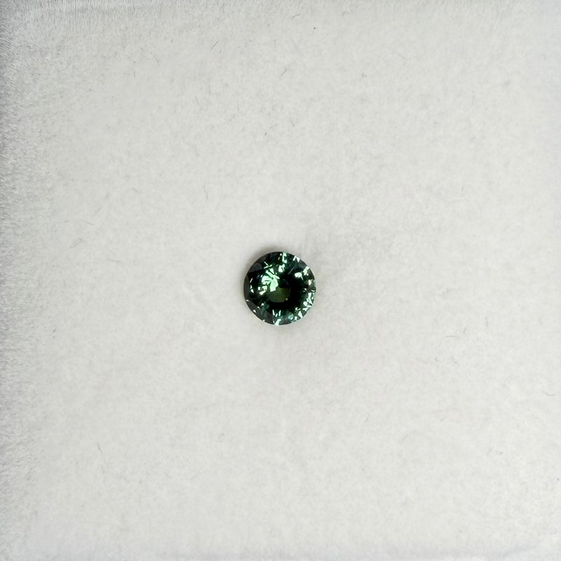 0.85ct Teal Round Sapphire
