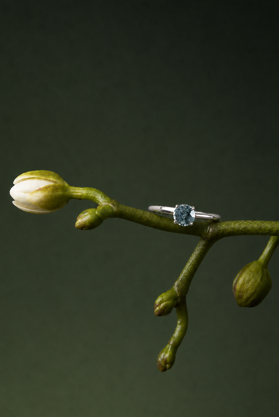 Bud Solitaire — 0.68ct Light Blue Sapphire